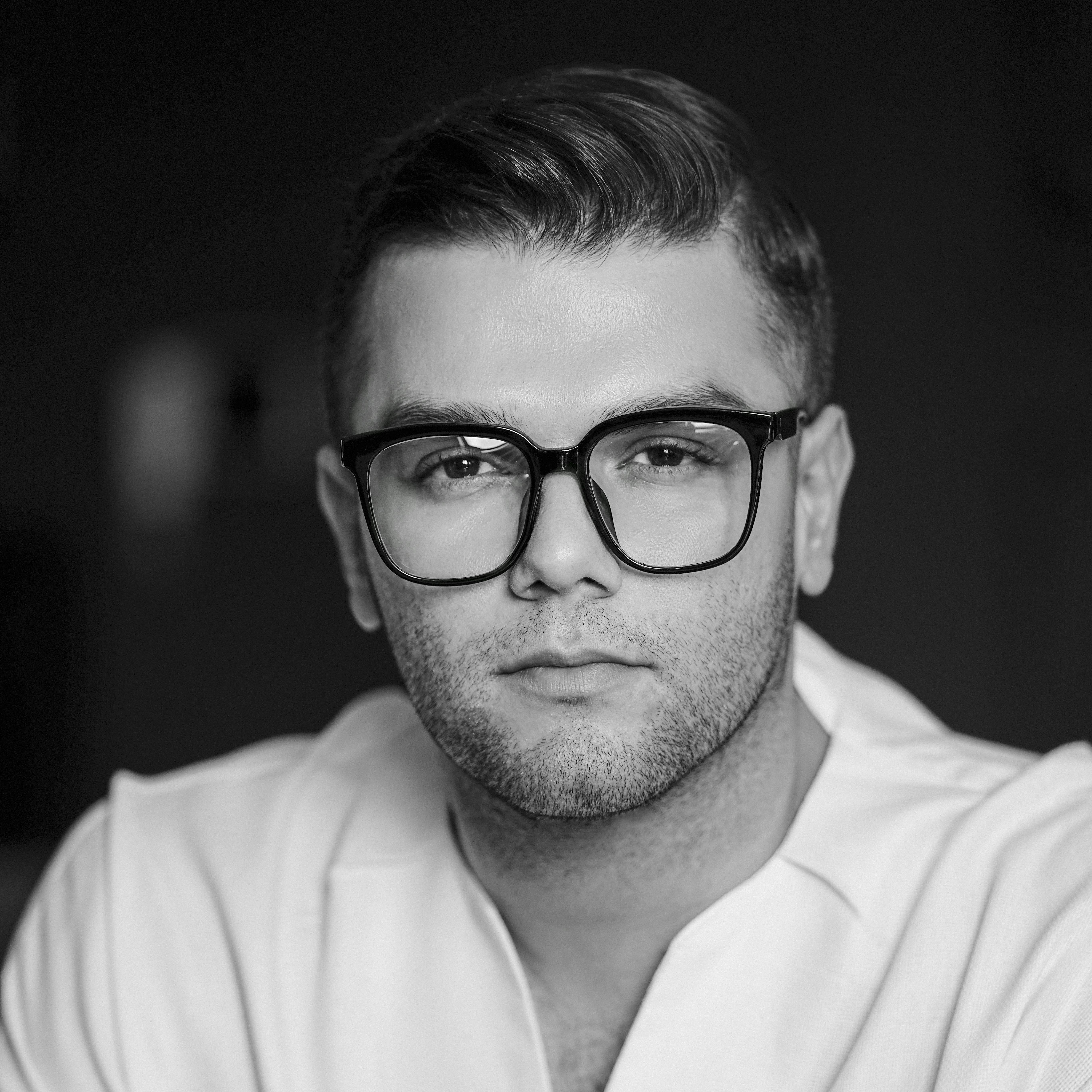 Marketing professional with glasses