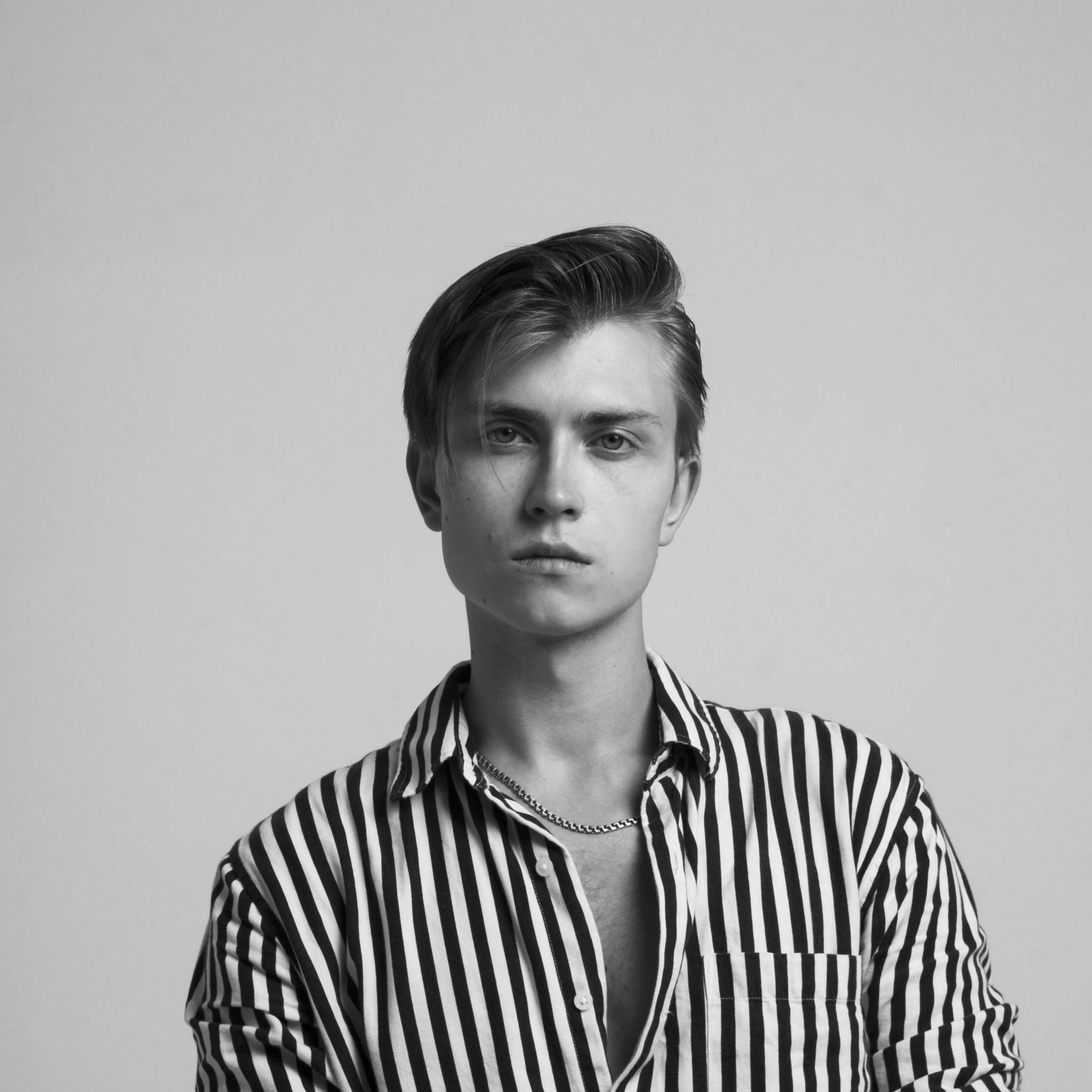 Young entrepreneur in striped shirt